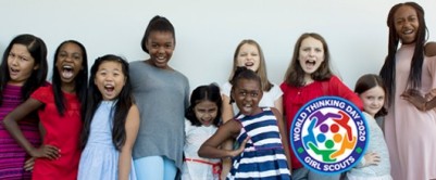 Girl Scout STEM Pledge Girls and volunteer experiencing STEM programming
