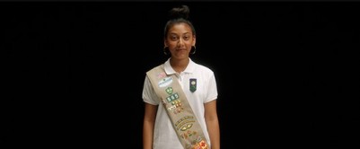 Girl Scout STEM Pledge Girls and volunteer experiencing STEM programming