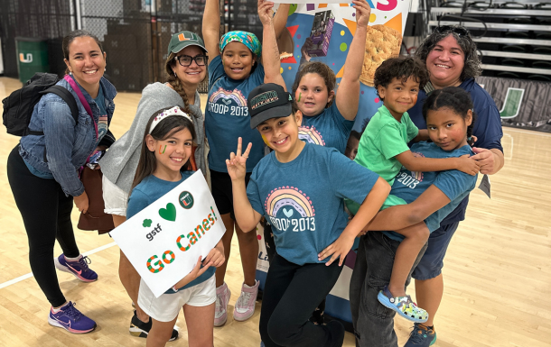 A group of girl scouts of diverse backgrounds at the Cookie U program