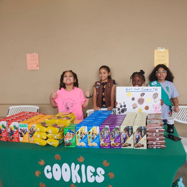 New Miami Girl Scout troop at a cookie booth