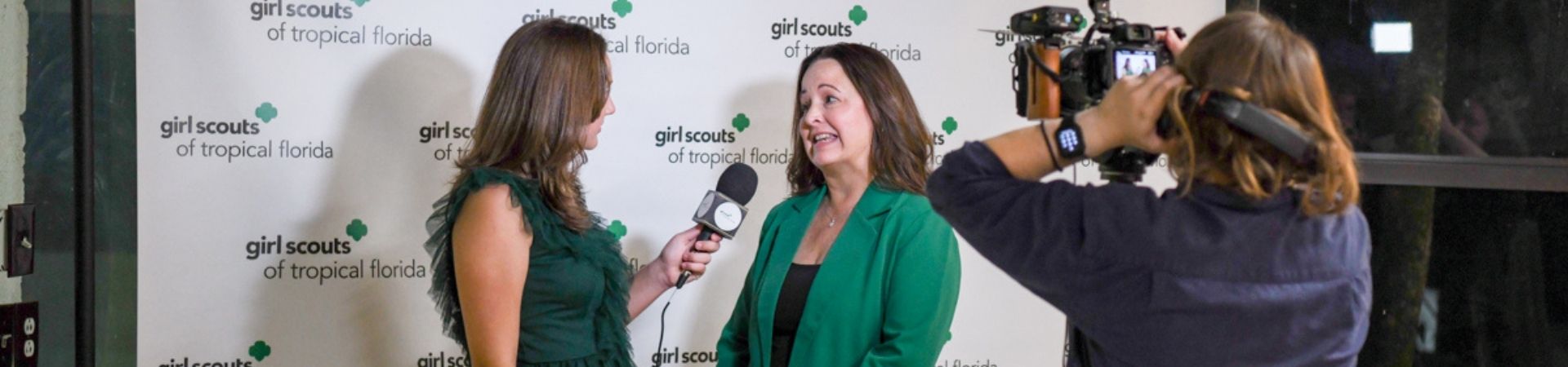  Two girl scouts with GSTF CEO Chelsea Wilkerson 