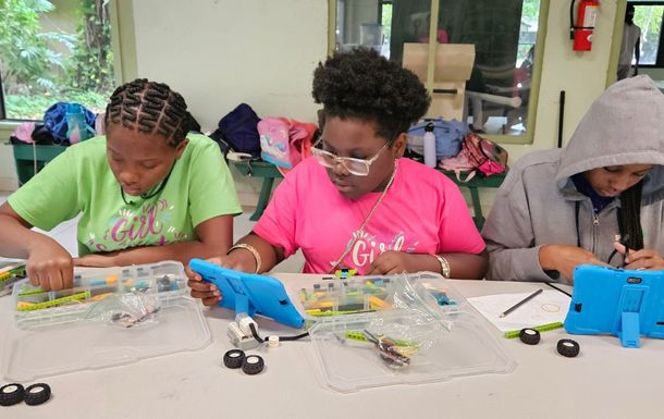 GIrl Scouts working on STEM project