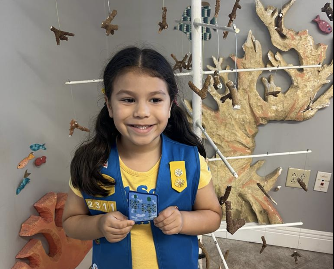 Daisy girl scout with reef hero patch